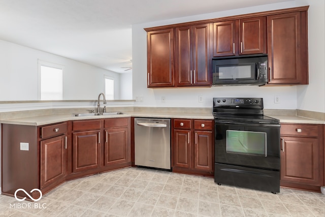 kitchen with black appliances and sink