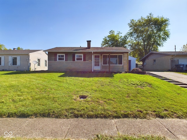 ranch-style home with a front yard