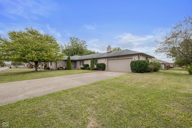 single story home featuring an attached garage, driveway, a chimney, and a front yard