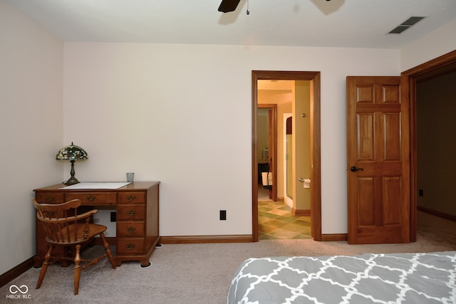 bedroom with ceiling fan and light colored carpet