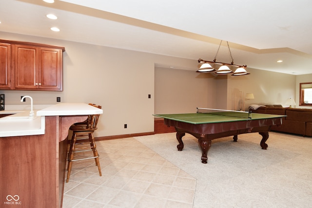 game room featuring pool table, sink, and light carpet