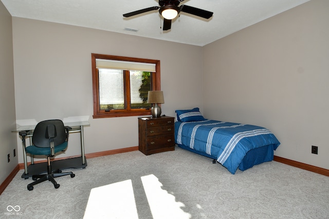 bedroom with ceiling fan and light colored carpet