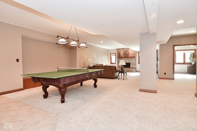 game room featuring light carpet, a fireplace, and pool table