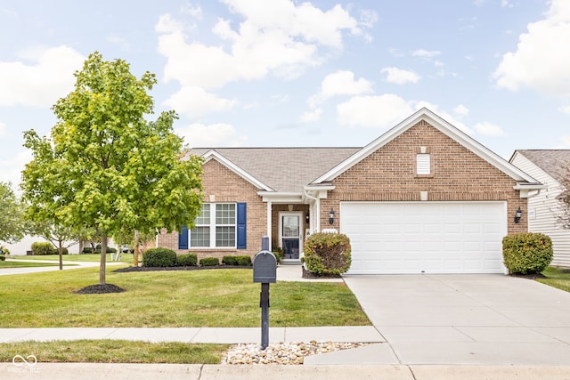 view of front of home with a garage and a front yard