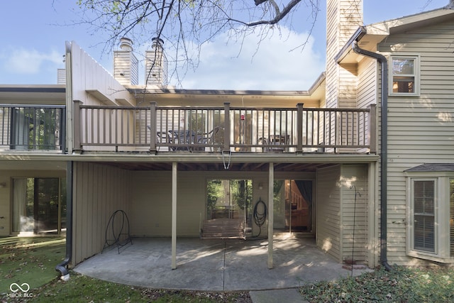 rear view of house featuring a patio