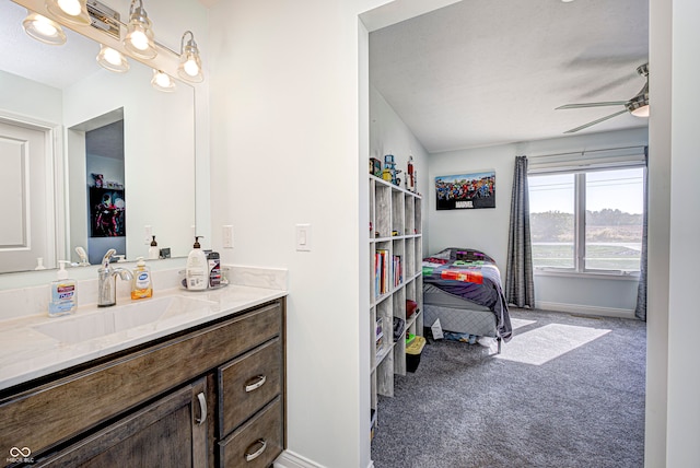 bathroom featuring vanity and ceiling fan