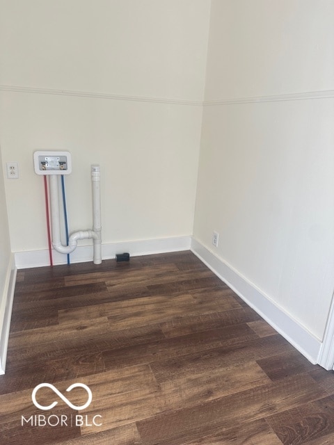 laundry area with washer hookup and dark hardwood / wood-style flooring