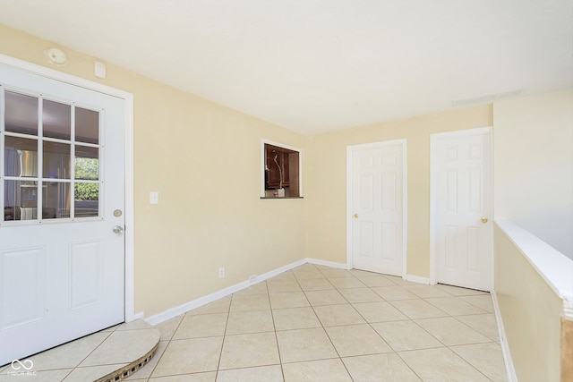 interior space featuring light tile patterned flooring