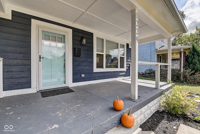 property entrance with a porch