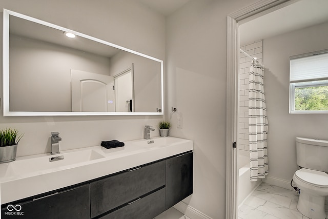 full bathroom featuring shower / bath combination with curtain, vanity, and toilet