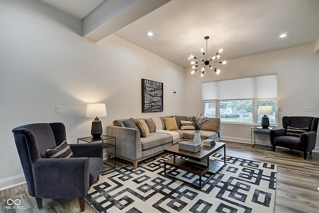 living room with beamed ceiling, hardwood / wood-style floors, and a chandelier