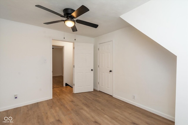 309 N Lasalle St, Indianapolis, IN 46201 - additional living space featuring ceiling fan, baseboards, and wood finished floors
