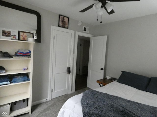 bedroom with ceiling fan and carpet flooring