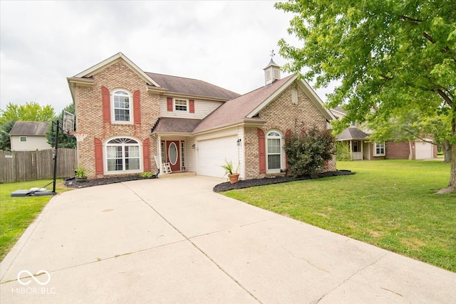 view of front property with a garage and a front lawn