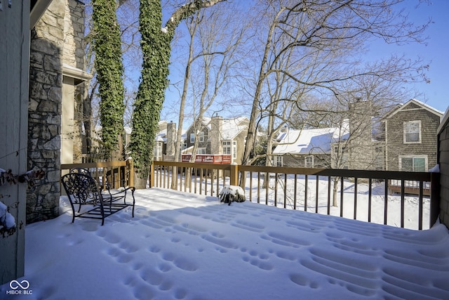 view of snow covered deck