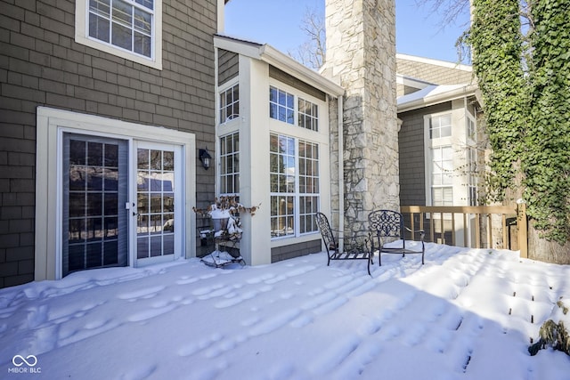 view of snow covered deck