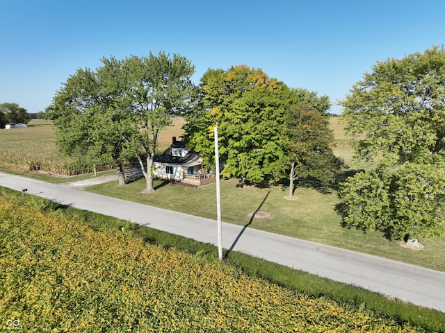 birds eye view of property with a rural view