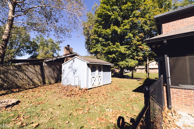 view of outdoor structure with a yard