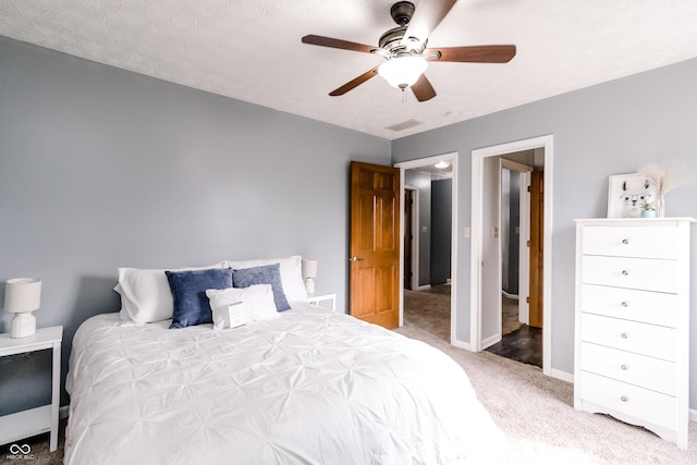 bedroom featuring carpet floors and ceiling fan