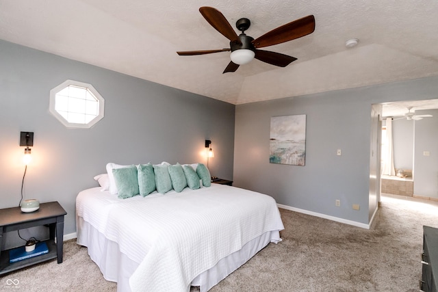 carpeted bedroom featuring lofted ceiling and ceiling fan