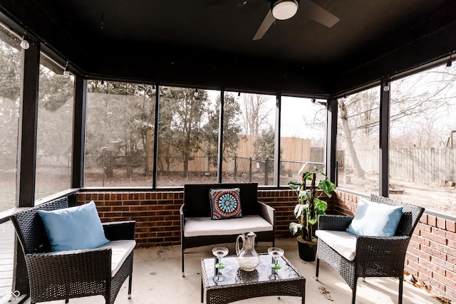 sunroom / solarium with ceiling fan