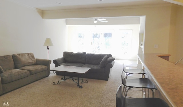 10781 Cedar Ridge Ln, Brownsburg, IN 46278 - living area with crown molding, a ceiling fan, and carpet floors