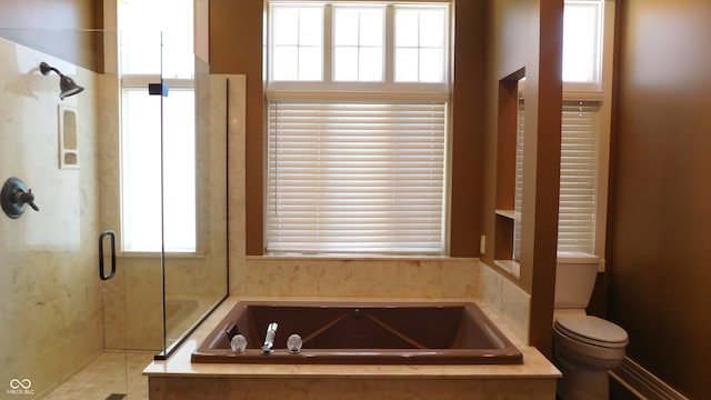 bathroom with independent shower and bath and toilet