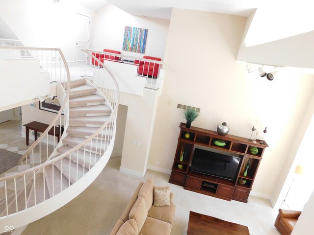 10781 Cedar Ridge Ln, Brownsburg, IN 46278 - stairway featuring carpet flooring and baseboards