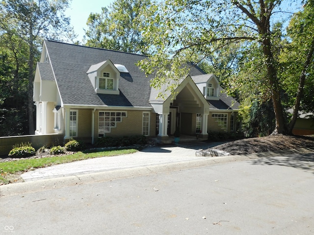 view of new england style home