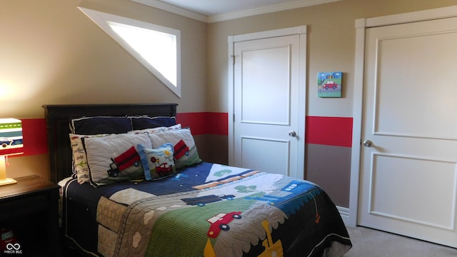 carpeted bedroom with ornamental molding