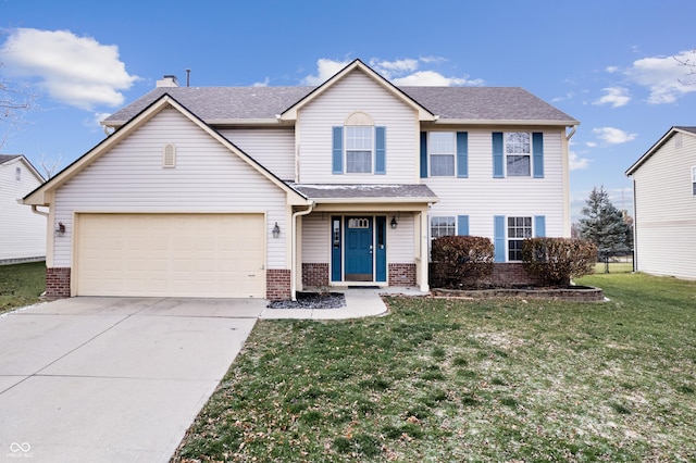 view of front of property featuring a garage and a front yard