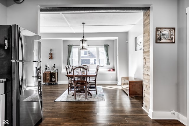 dining space featuring dark hardwood / wood-style floors