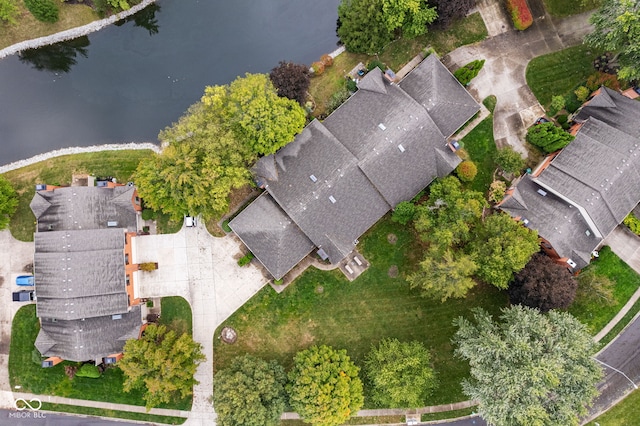 drone / aerial view with a water view