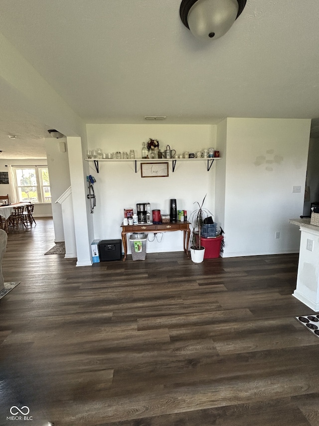 interior space featuring dark hardwood / wood-style flooring