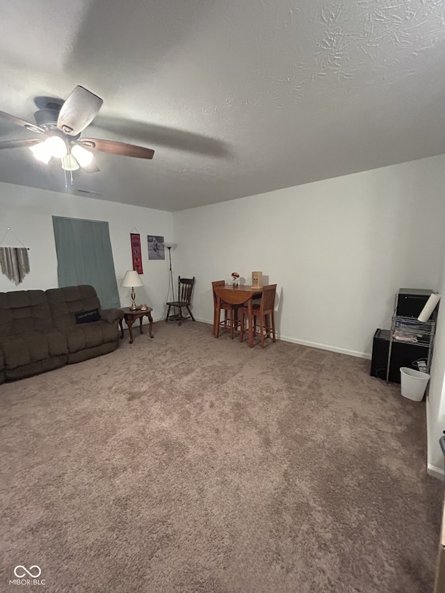 interior space featuring ceiling fan