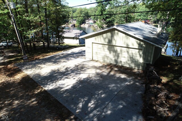 view of side of home featuring a water view