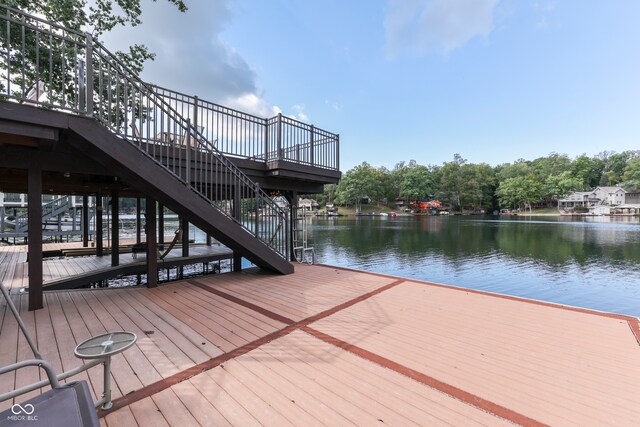 dock area with a water view