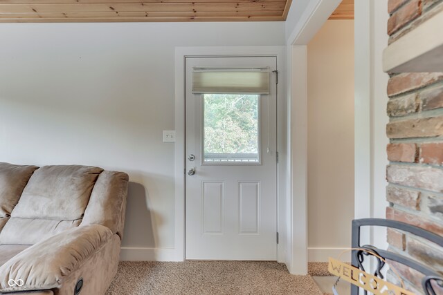 entryway with light colored carpet and wooden ceiling