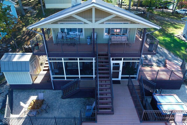 7438 Haw Dr, Nineveh, IN 46164 - rear view of property featuring stairs, a deck, a patio area, and stone siding