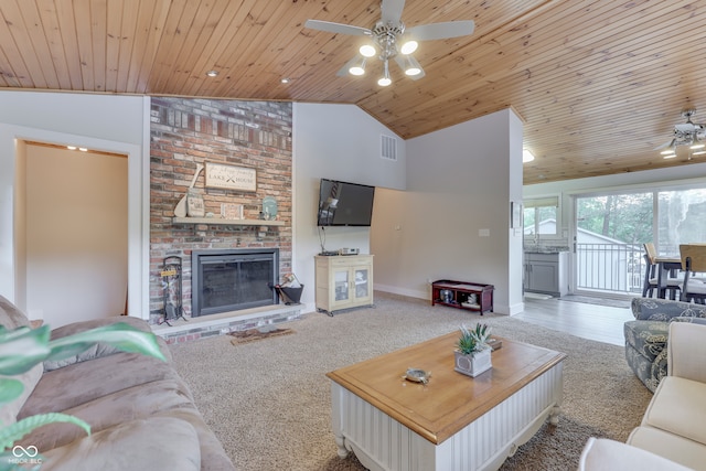 7438 Haw Dr, Nineveh, IN 46164 - living room with baseboards, wooden ceiling, ceiling fan, a fireplace, and vaulted ceiling