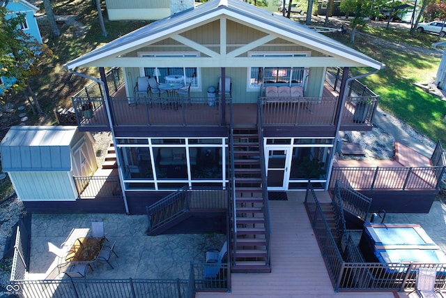 7438 Haw Dr, Nineveh, IN 46164 - rear view of house featuring a patio, stone siding, a deck, and stairs