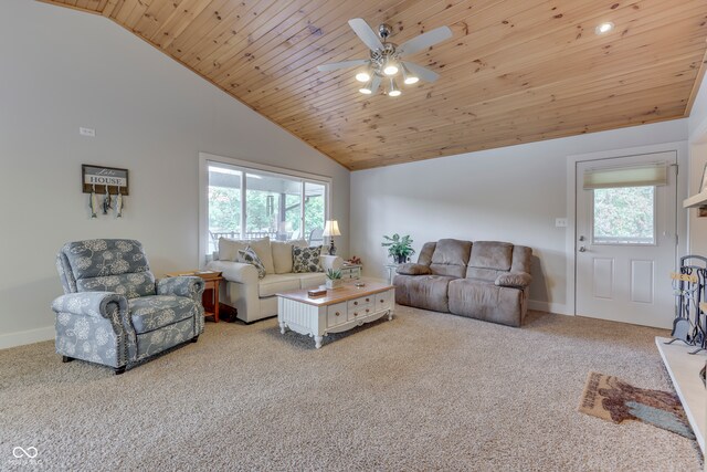 carpeted living room with a healthy amount of sunlight, wood ceiling, ceiling fan, and high vaulted ceiling