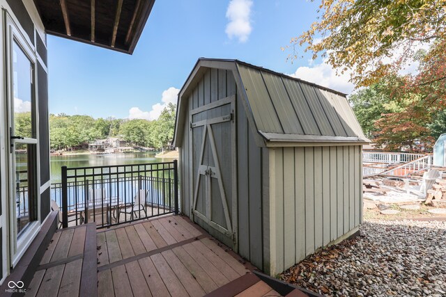 view of outbuilding featuring a water view