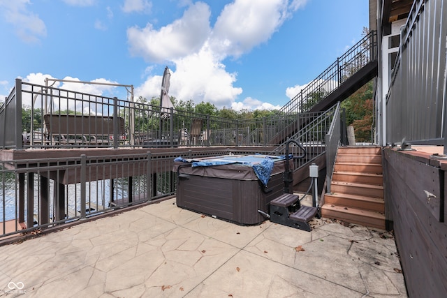 7438 Haw Dr, Nineveh, IN 46164 - view of patio with stairway and a hot tub