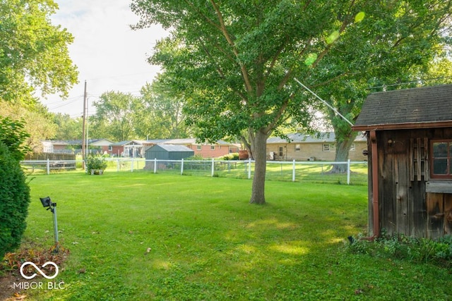 view of yard featuring a storage shed