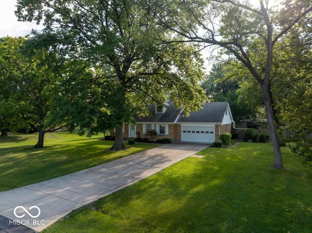 view of front of property with a garage and a front yard