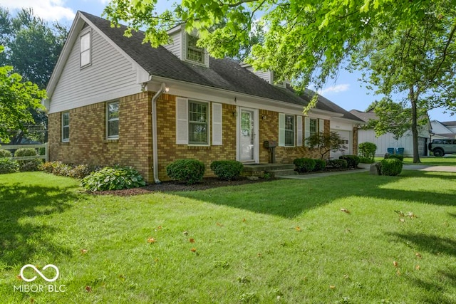 cape cod home featuring a front yard