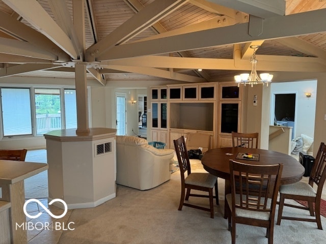 carpeted dining space featuring vaulted ceiling with beams, wood ceiling, and a notable chandelier