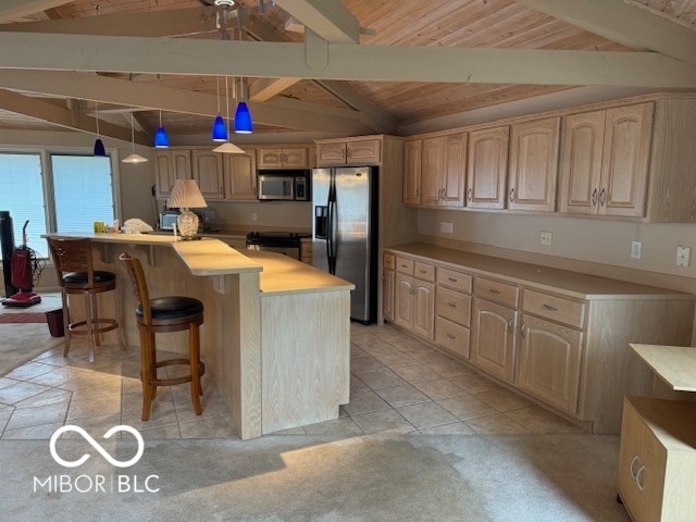 kitchen with appliances with stainless steel finishes, hanging light fixtures, light brown cabinets, wooden ceiling, and vaulted ceiling with beams