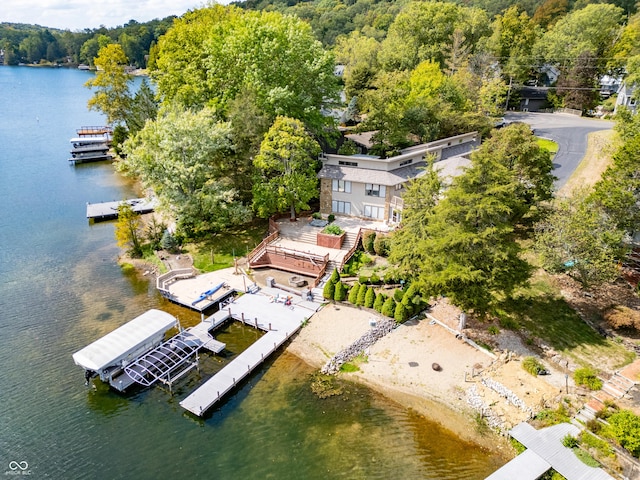 bird's eye view of a nearby body of water and a forest